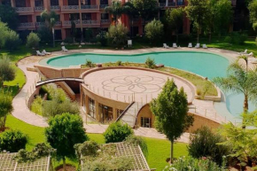 Bel appartement RDJ face piscine résidence haut standing